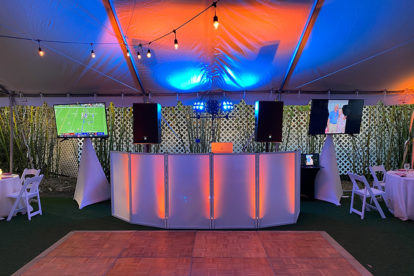 Palm Island Wedding DJ booth with TVs