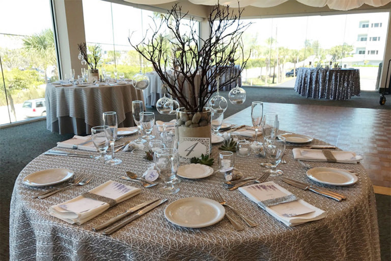 centerpiece at wedding reception made with branches