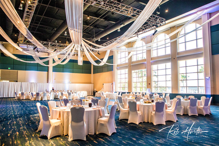 wedding reception with tall, draped ceilings