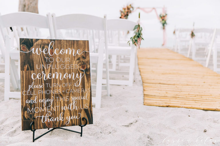 wooden wedding ceremony sign with cursive lettering