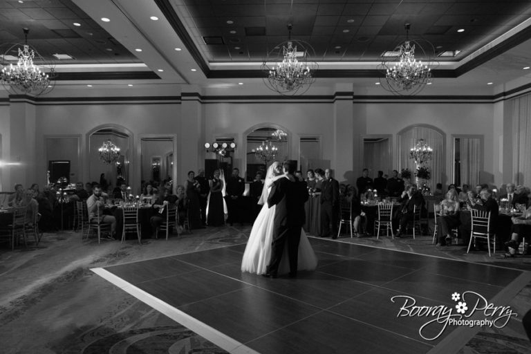 Upscale Wedding Planner - bride and groom's first dance at a Hotel Ballroom Reception