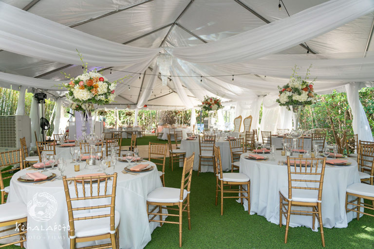 wedding reception under a tent outdoors at the Palm Island Resort