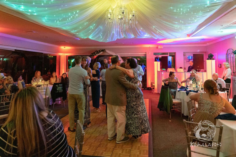 wedding guests dancing under colorful lighting at The Waverly