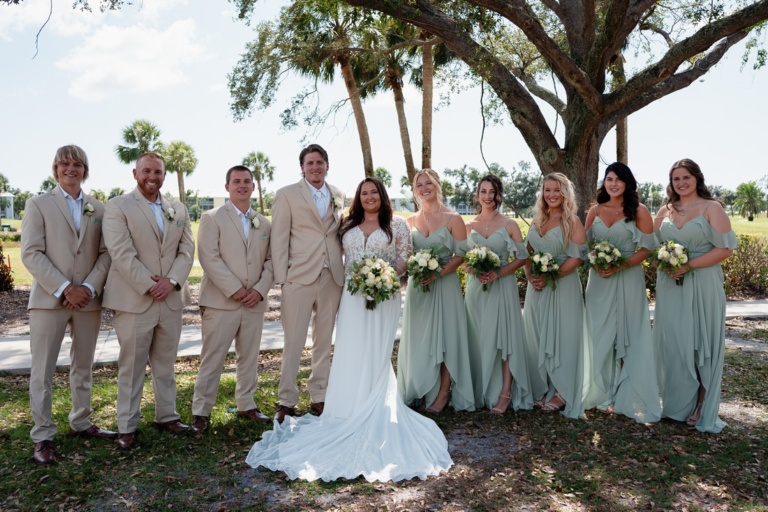 bride and groom with five bridesmaids and five groomsmen